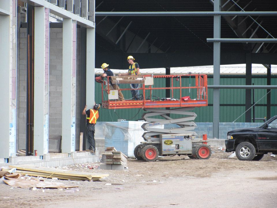 Topline Electric crew at a commercial building site