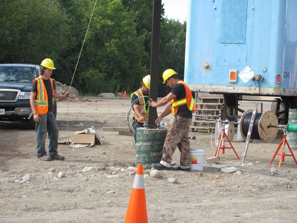 Topline Electric team working at an outdoor job site